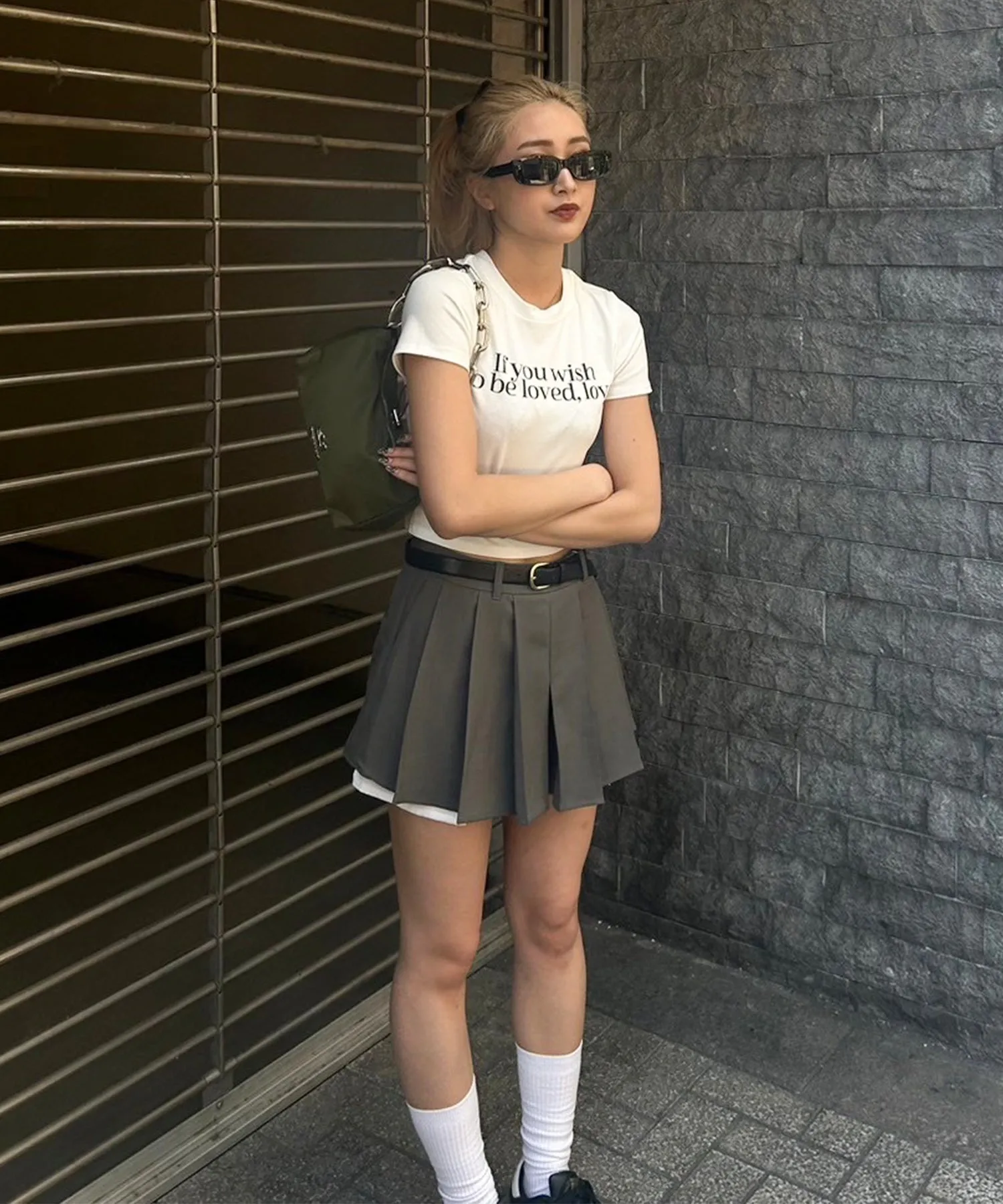 Layered pocket pleated mini skirt