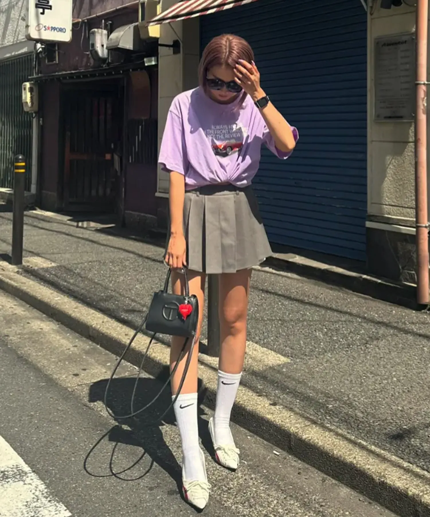 Layered pocket pleated mini skirt
